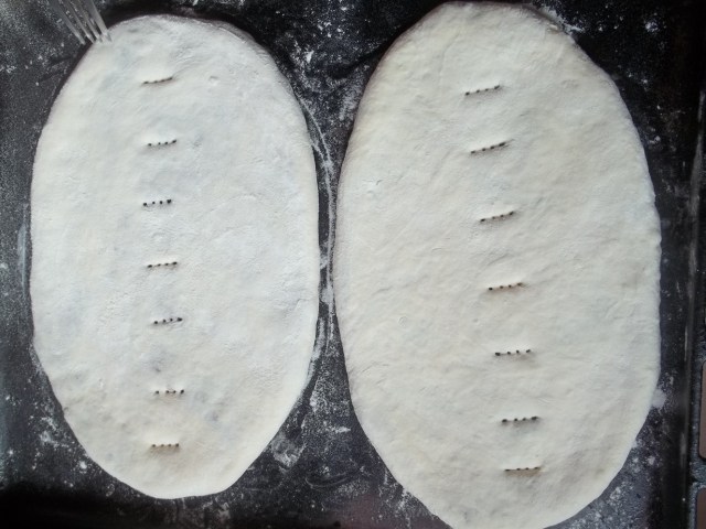 Pricking the Lobiani before baking - Copy