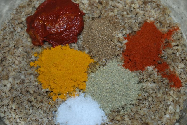 Adding Spices and Tomato Puree