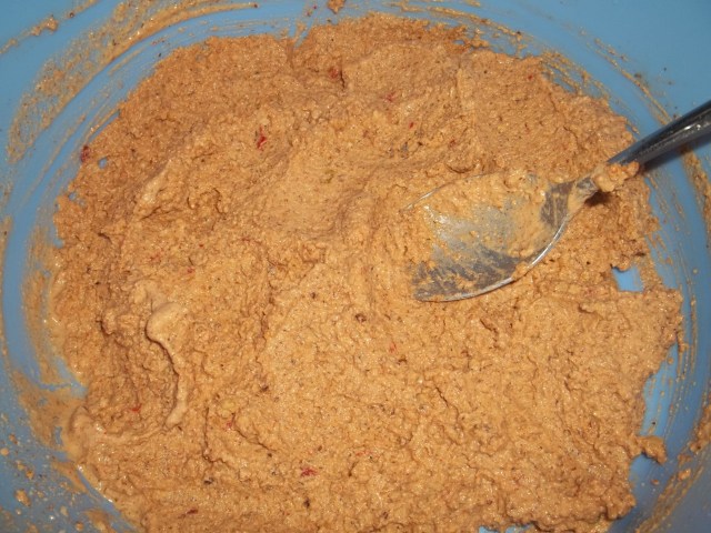 Mixing Walnuts with Spices and Ajika