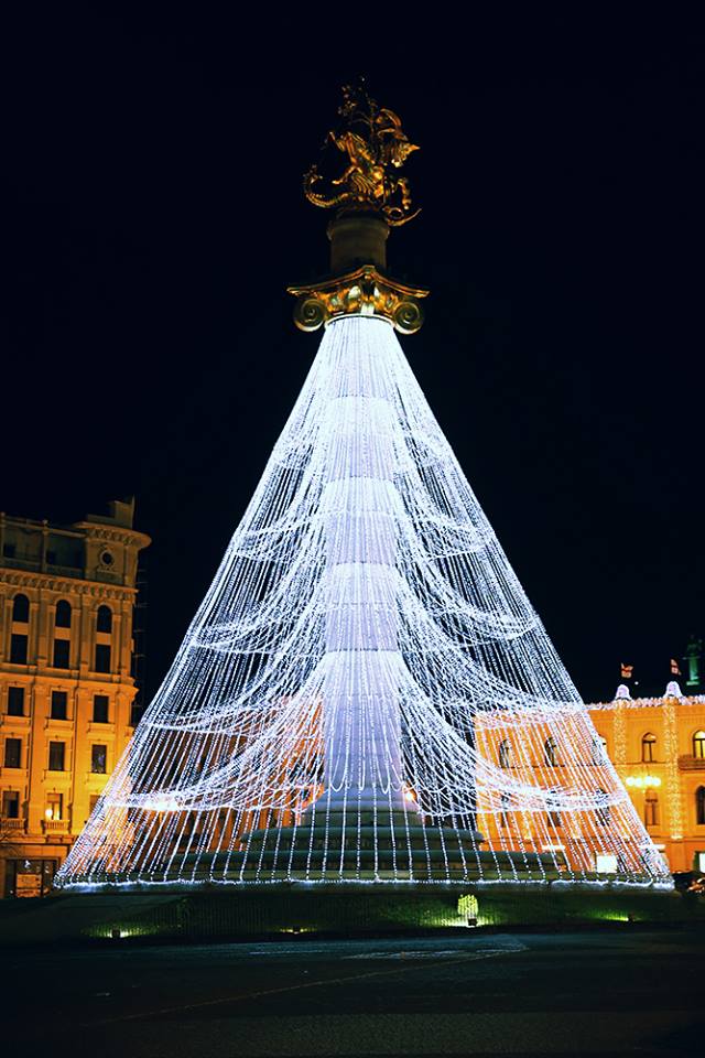 The Freedom Monument decorated with Christmas lights