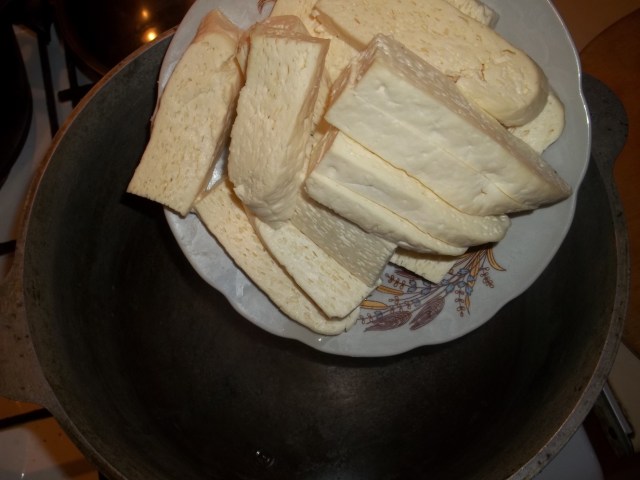 Add cheese to a pot - Copy