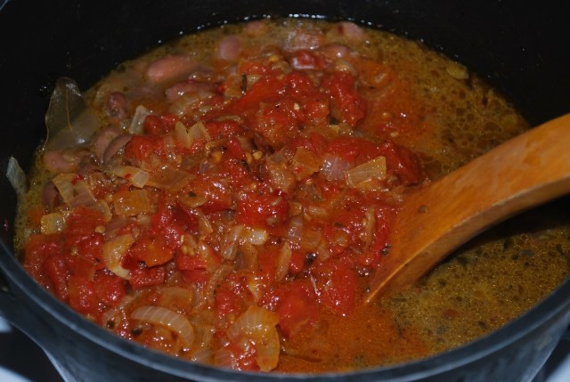 Adding Fried tomatoes and Onions