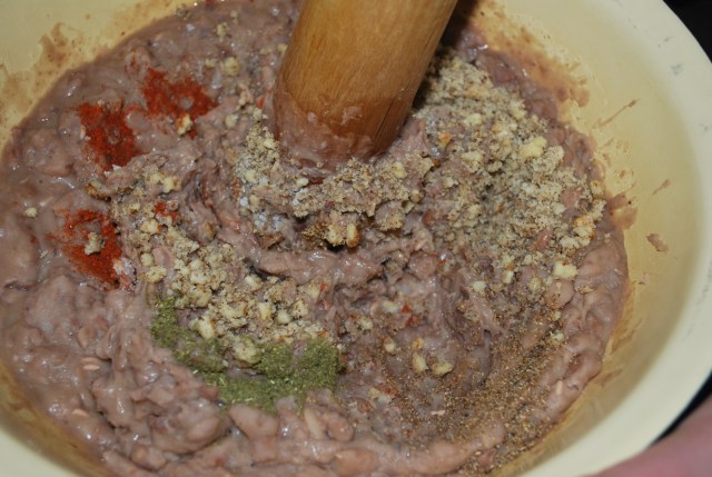 Mashing nuts, spices, salt and herbs - Copy