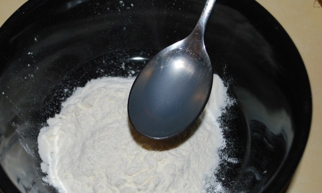 Adding water to flour